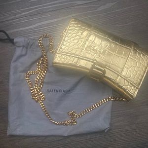 Gold Balenciaga Hourglass Wallet on chain